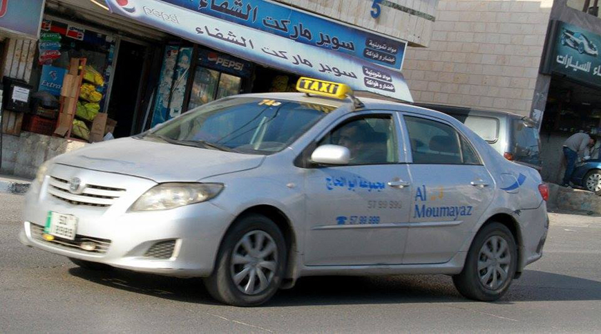 Taxi Moumayaz will replace 300 cars with hybrid vehicles and up to 100 cars with electric vehicles, under an agreement signed with the Greater Amman Municipality (Photo by Osama Aqarbeh)